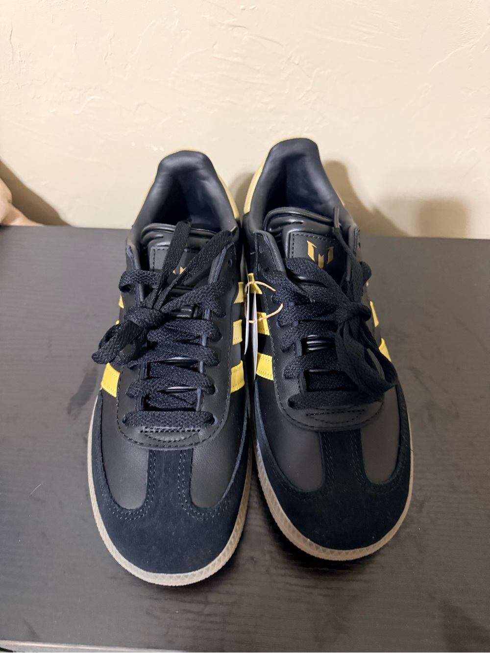 adidas Samba Messi Black Sneakers with Yellow Accents.
